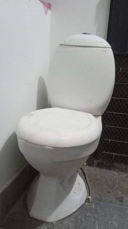 slightly used commode for sell white colour 4