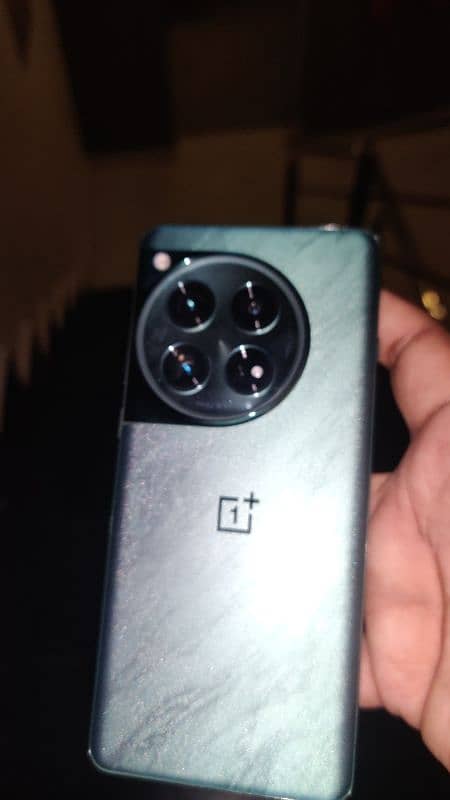 OnePlus 12 box pack with original box charger and all accessories. . . 0