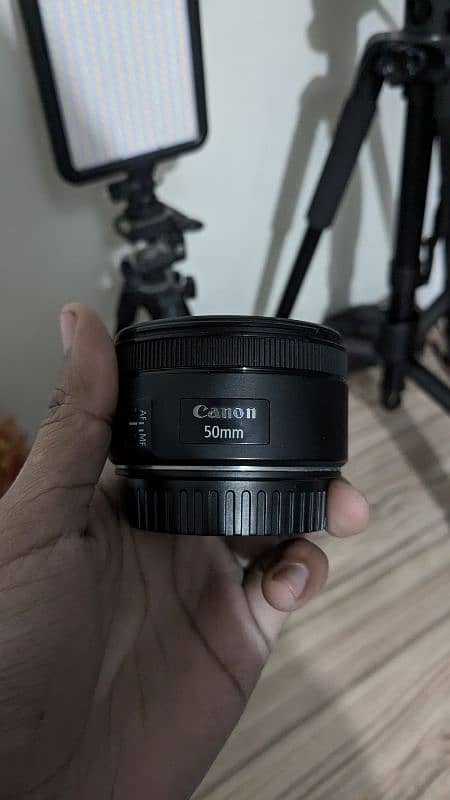 Canon 50mm 1.8 STM with hood 0