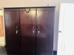 3 door wooden cupboard