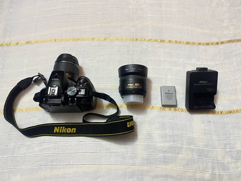 Dslr Nikon d5300 with Af-p 18-55mm VR and Nikon Af-S 35mm f1.8g Lens. 1