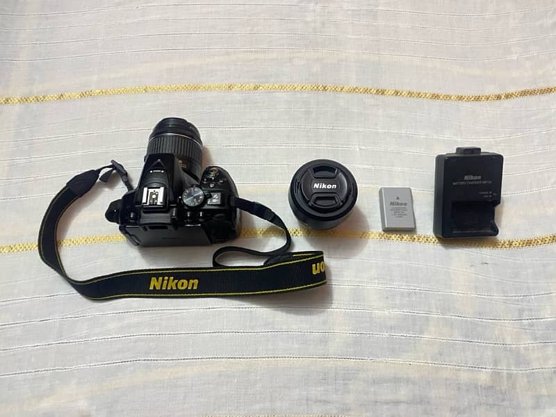 Dslr Nikon d5300 with Af-p 18-55mm VR and Nikon Af-S 35mm f1.8g Lens. 2