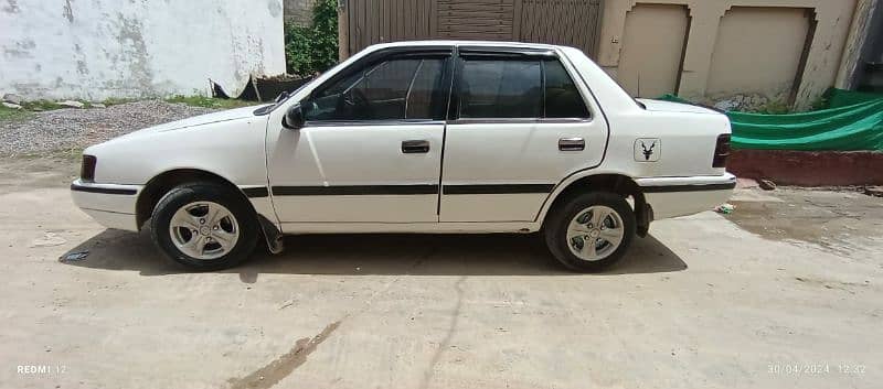 Hyundai Excel 1990 exchange with mini panjaro down model 1