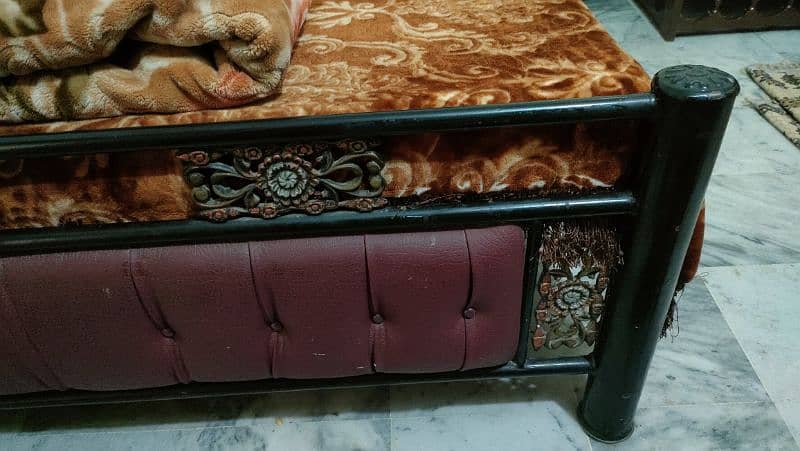 iron and cushion bed 15