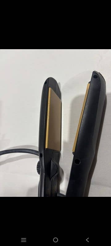 Braun professional hair straightener with packing. 5