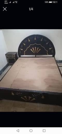 Wooden queen size bed for sale.