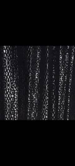 black n silver color curtains