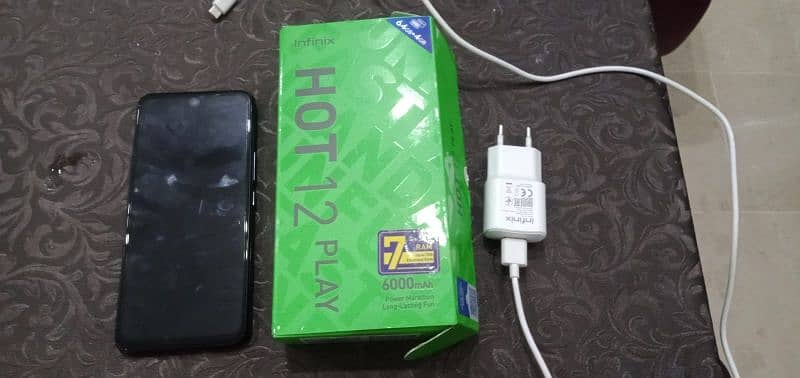 Infinix Hot 12 play 4 gb Ram 64 gb Rom  Octa core processor 0