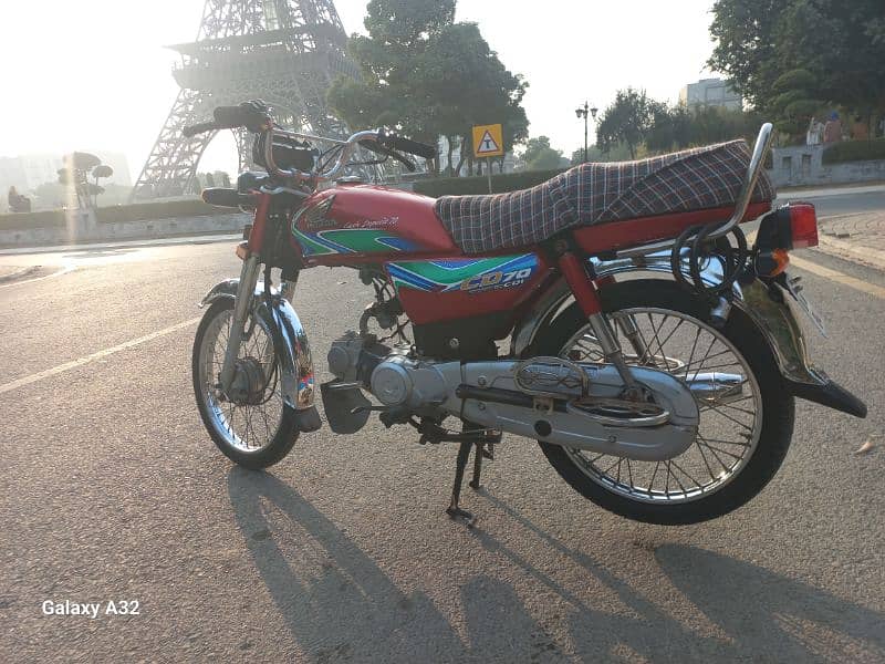 Honda 70Cc Red Colour Bb Block Bahria Town Lahore 0