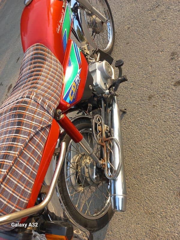 Honda 70Cc Red Colour Bb Block Bahria Town Lahore 2