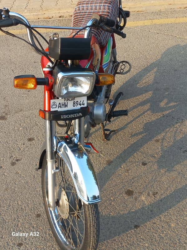 Honda 70Cc Red Colour Bb Block Bahria Town Lahore 5