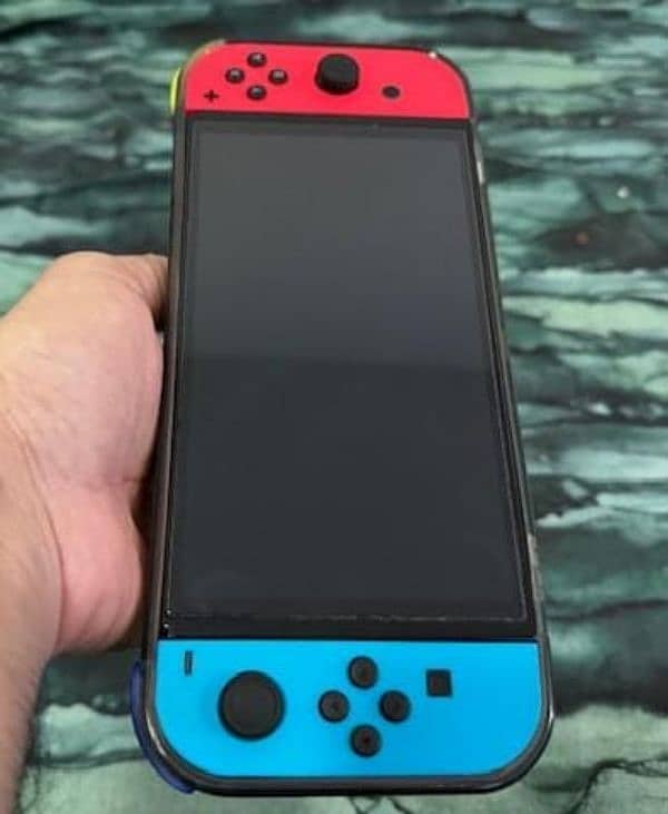 NINTENDO SWITCH OLED 7