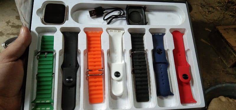 NEW smart watch with 8 bands, charger, box 1