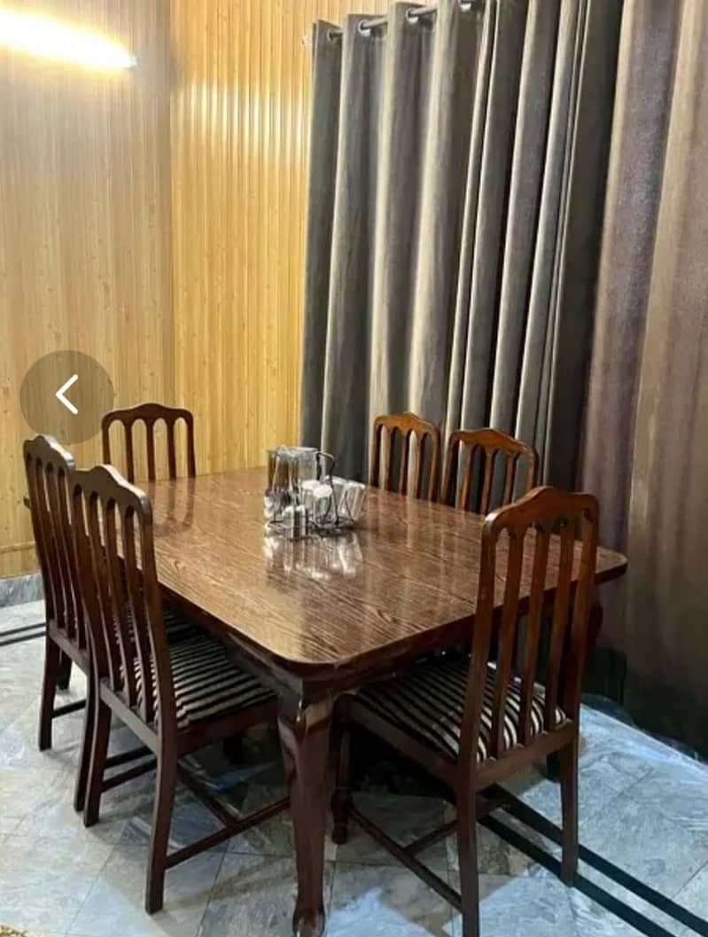 Excellent condition dining table with 6 chairs, neat and clean 2