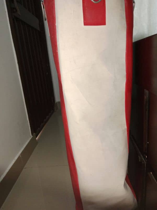 punching bag present in good condition and is a little bit damaged 1