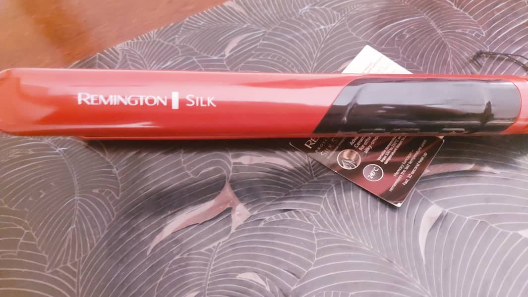 V slight used remington silk ceremic hair straightener 3