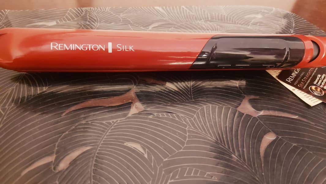 V slight used remington silk ceremic hair straightener 5