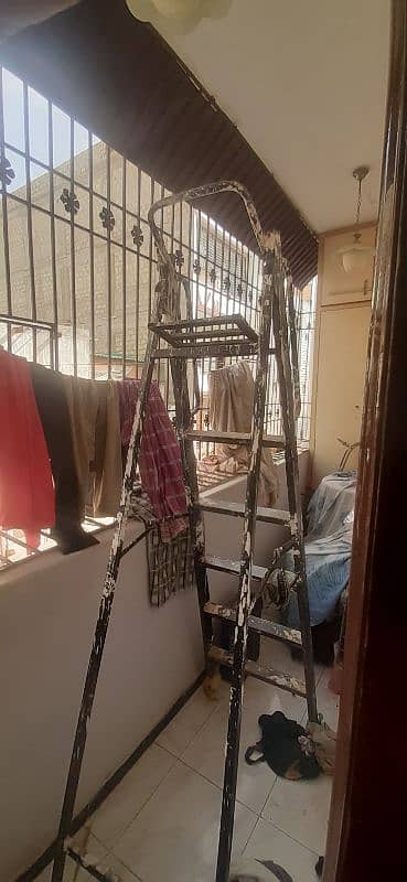 folding metal ladder almost 7.5 feet size good condition 0