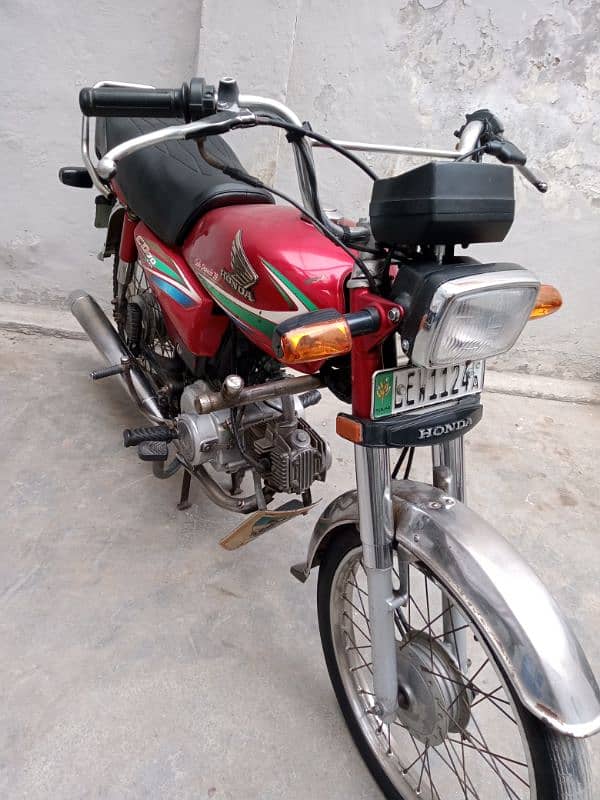 Honda 70 model 2016 A red colour good condition 7