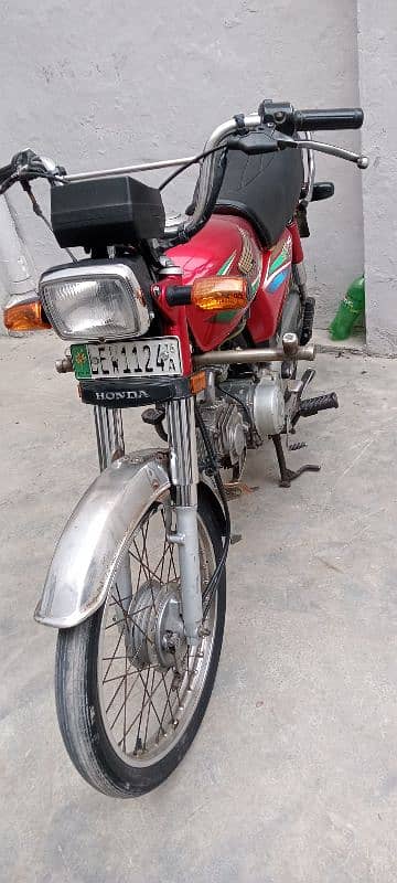 Honda 70 model 2016 A red colour good condition 16