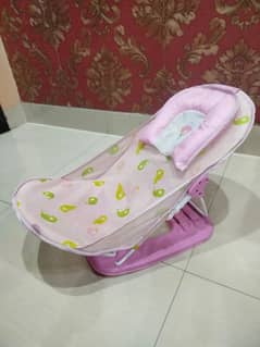 Deluxe baby bathing seat.