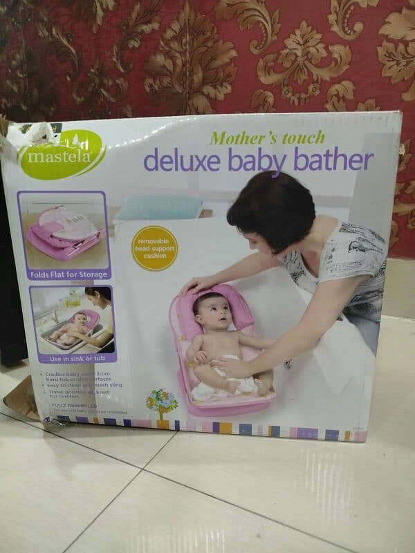 Deluxe baby bathing seat. 3