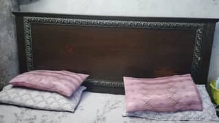 bed, dressing table, one side table