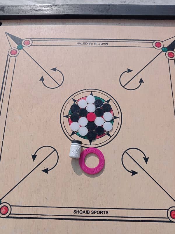 Carrom Board with coin, striker and powder 5