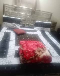 iron bed with tiger form mattress