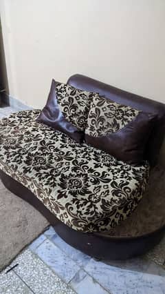 2 persons sofa Sethi (Dewan) for sale with 2 cushions (urgent)