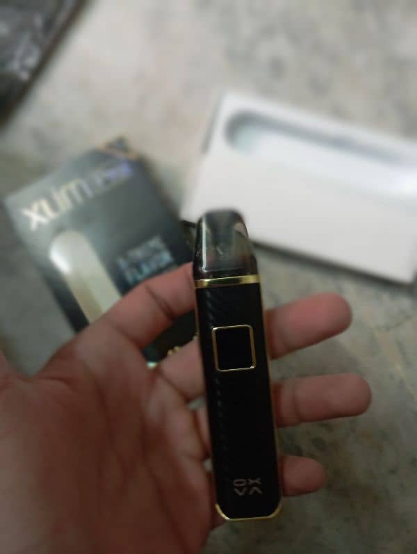 oxva xlim pro pod/vape just box open with band and cable 0.4 coil 1