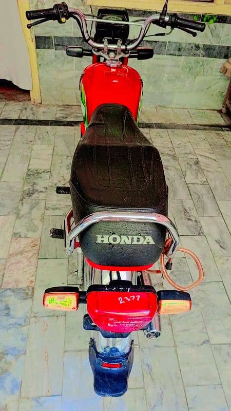 Honda 70 good condition  model 2021 shape 22 phone number 03078516744 5