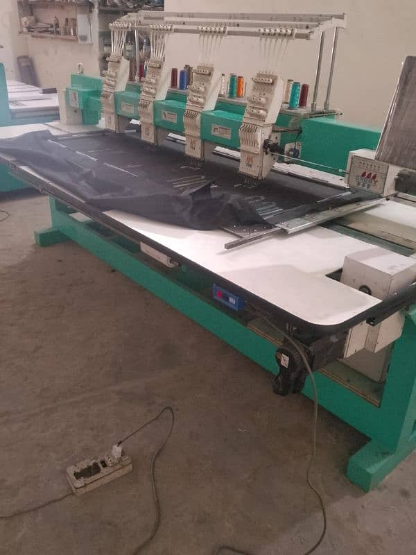 4 hd embroidery machine new condition 400 by 600 nine color 1