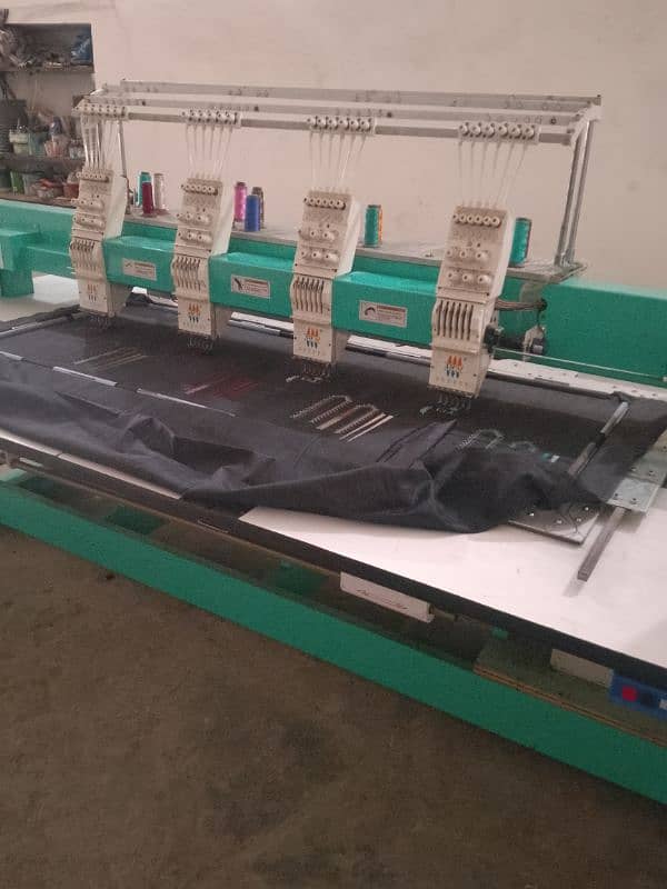 4 hd embroidery machine new condition 400 by 600 nine color 2