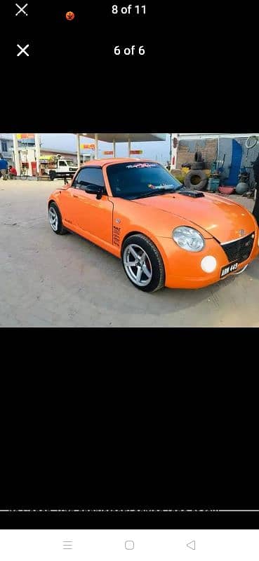 Daihatsu Copen 2 door convertible. 1