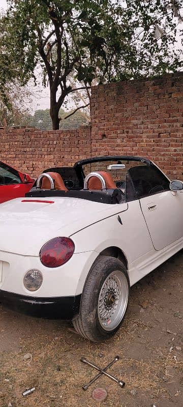 Daihatsu Copen 2 door convertible. 5