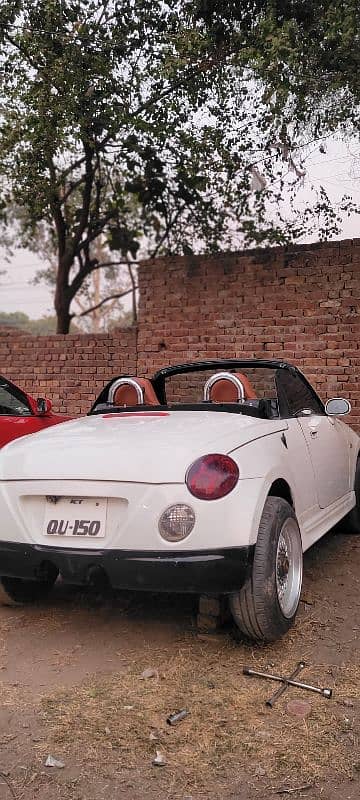 Daihatsu Copen 2 door convertible. 8