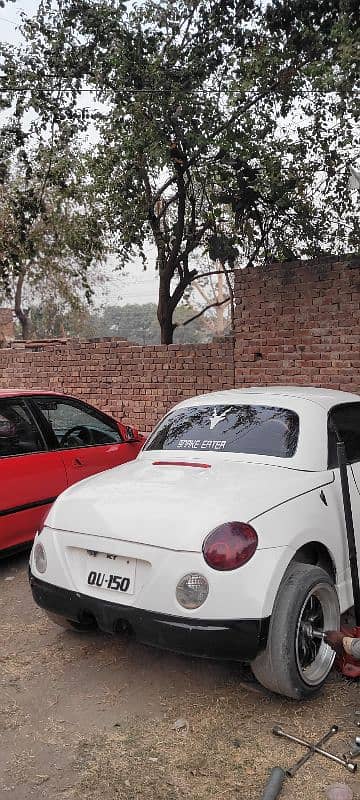 Daihatsu Copen 2 door convertible. 9