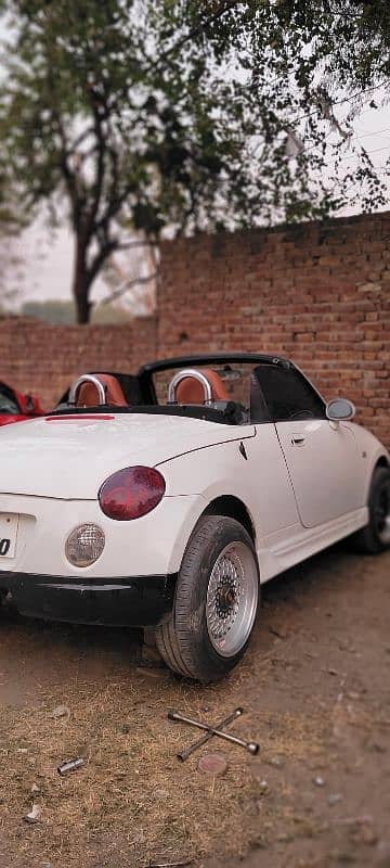 Daihatsu Copen 2 door convertible. 11