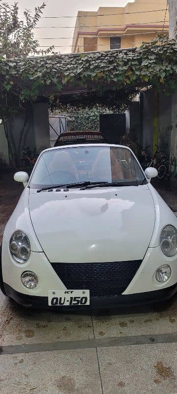 Daihatsu Copen 2 door convertible. 15