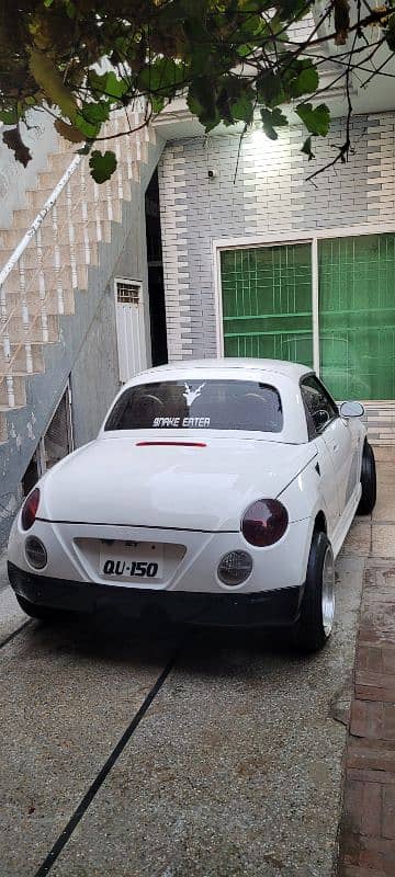 Daihatsu Copen 2 door convertible. 16