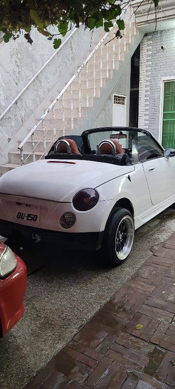 Daihatsu Copen 2 door convertible. 17