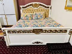 complete wooden furniture. bed with two sides table