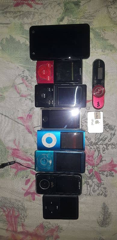 imported handfree & (MP3) sony multi media plyers,apple ipods 9