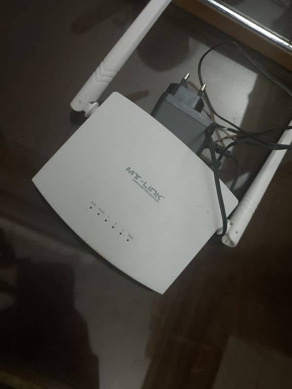 10out 10 condition new router with charger 1