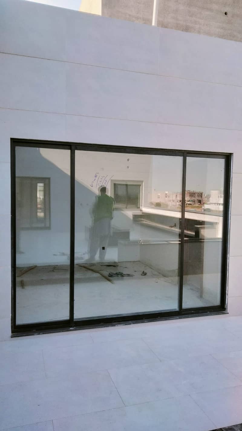 Aluminum windows/Glass works /Glass Doors/ Doors/glass cabinets 12