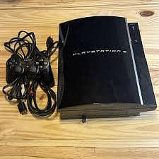 Play Station 3 with 1 controller and 2 games