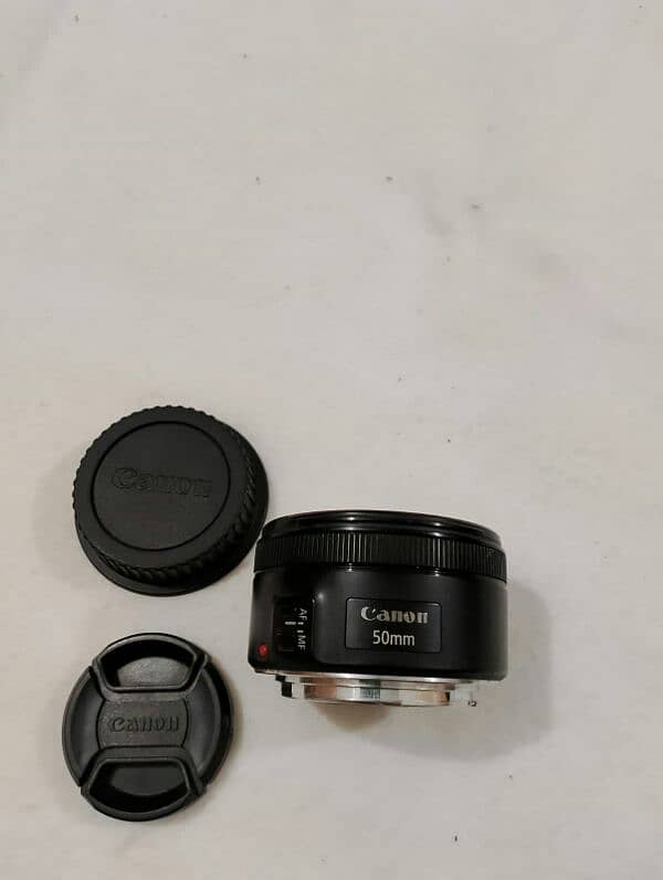 Canon 50mm STM 1.8 only lens good condition perfect working 0