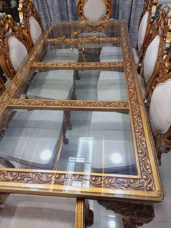 golden dining table and 8 chairs 1