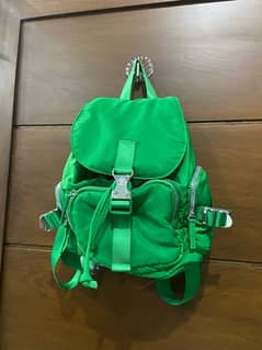 New green mini backpack Primark